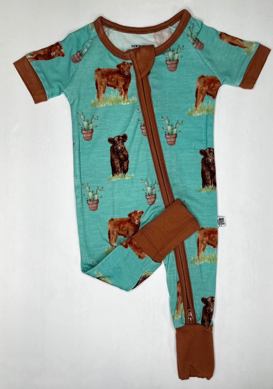 Teal Cow SS Zippy